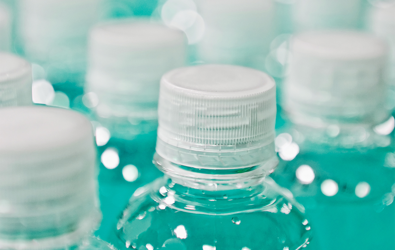 Close up of juice in plastic bottles