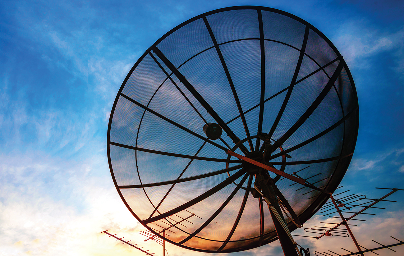 Satellite dish at dusk