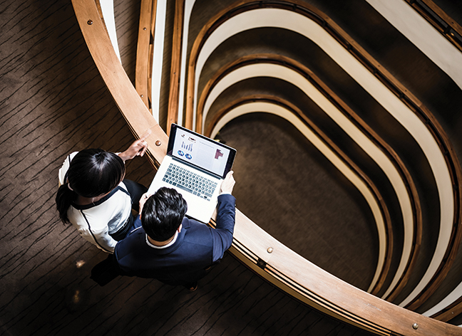 Business People Having a Meeting on The Hallway