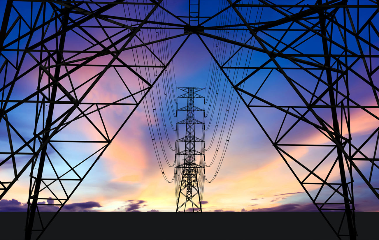 Transmission towers at night
